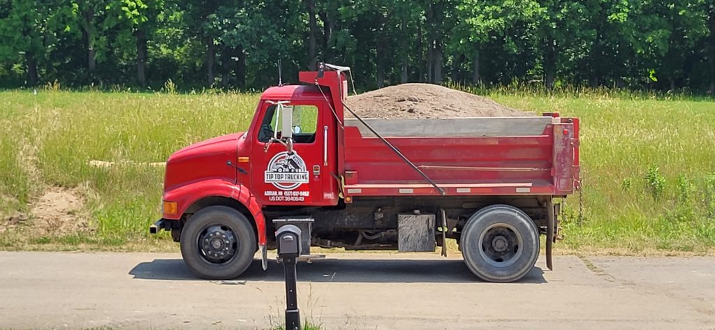 Delivering gravel, sand, and fill dirt to your residence